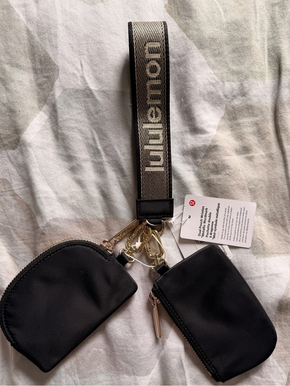 Lululemon black dual pouch wristlet with gold hardware gold sparkle wristlet